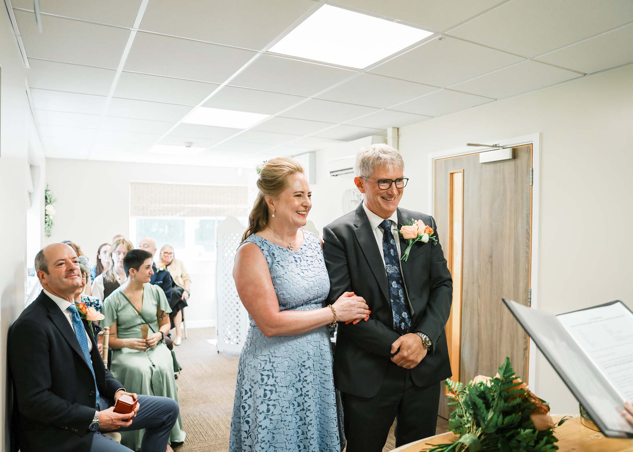 A bride and groom getting married in woodbridge registry office on a wedding day in Woodbridge captured by Suffolk Wedding Photographer Hayley Denston Photography